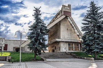Trostyanets, Sumy Oblast, Ukraine - June 18, 2023: Facade beaten by fragments and a broken roof of...