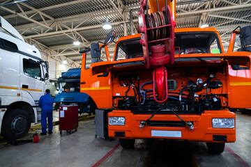 Trucks repair in car service.