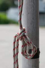 rope with knot and pole outdoors 