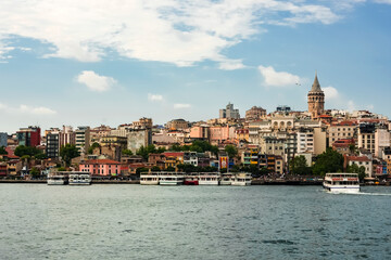 Fototapeta premium the galata district with its splendid tower photographed from the Galata bridge