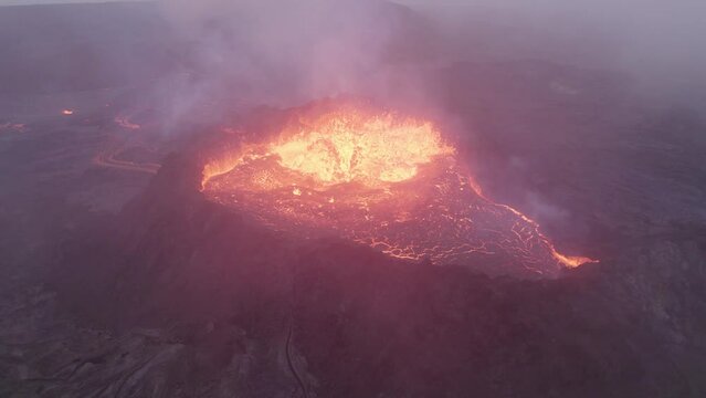 Drone view of burning hot lava bubbling and steaming
