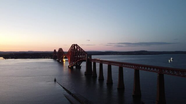 Sunset on the tracks: Crossing the Forth Road Bridge