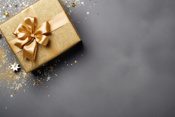 Gifts or presents boxes with gold bows and confetti on gray background, top view. AI generated