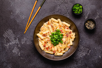 Spicy Rice Cake with Cheese and Bacon or Cream Teokbokki, Tteokbokki.