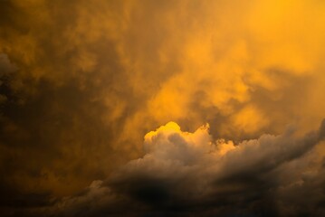 Illuminated by a vibrant yellow sky at night