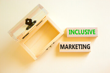 Inclusive marketing symbol. Concept words Inclusive marketing on beautiful wooden block. Beautiful white table white background. Wooden empty chest. Business inclusive marketing concept. Copy space.