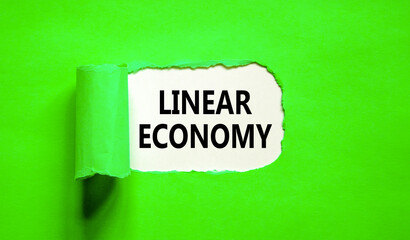 Linear economy symbol. Concept words Linear economy on beautiful white paper. Beautiful green background. Business linear economy concept. Copy space.