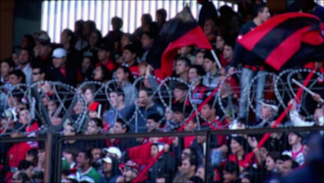 Blurred Soccer Fans during A Football Match at a Soccer Stadium in Argentina. 4K Resolution.