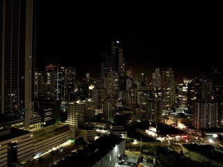 Fototapeta na wymiar Vibrant cityscape of Panama City illuminated by the night lights.