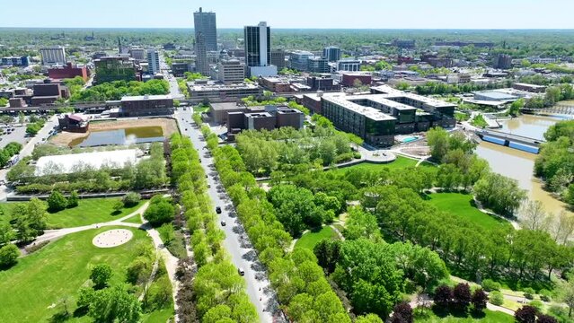 Headwaters Park aerial dolly shot toward downtown Fort Wayne
