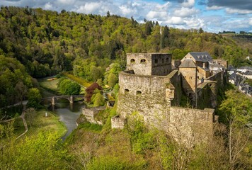 Fototapeta premium Aerial view of the historic Bouillon Castle and the forests of Belgian Ardennes