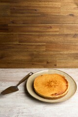 Closeup of a delicious biscuit on the wooden table with a wooden background