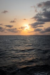 sunset sun on the horizon over the sea