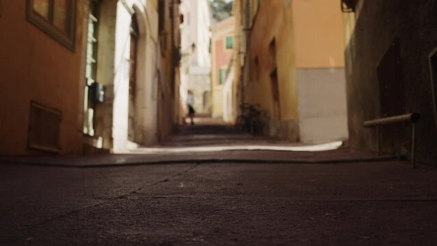 Close focus low angle background of Old city of Nice with vibrant walls and narrow streets