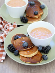 pancakes with fruit and berry smoothie