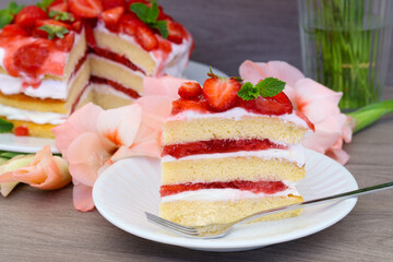 Strawberry layered cake, sliced