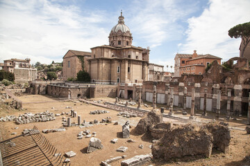 Fototapeta premium Trajan's Forum and Church of Santa Maria di Loreto in the background, Rome, Italy.
