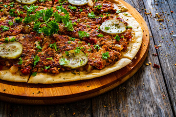 Smash burger tacos with fried minced meat and vegetables