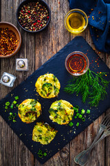Vegetable savory muffins on wooden background