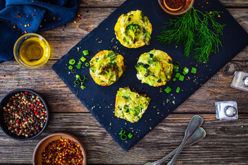 Vegetable savory muffins on wooden background