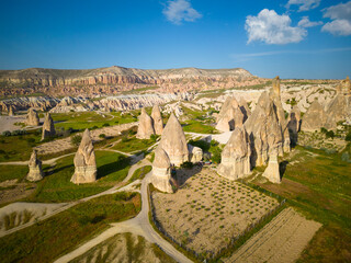 Fairy chimneys in Goreme Historic National Park in Cappadocia, Central Anatolia, Nevsehir Province, Turkey. Goreme Historic National Park is a UNESCO World Heritage Site since 1985. 