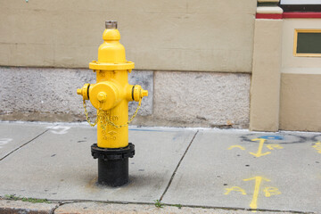 fire hydrant on a city street embodies preparedness, safety, and urban infrastructure, serving as a symbol of protection and readiness for potential emergencies