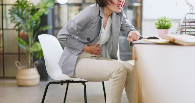 business woman has stomachache