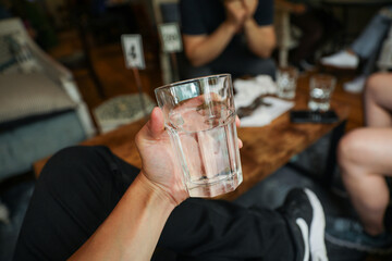 glass cup on a table, symbolizing clarity, transparency, and receptivity to new ideas and perspectives. Metaphor for openness