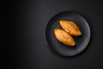 Delicious baked potato cutlet stuffed with chicken and vegetables, spices and salt