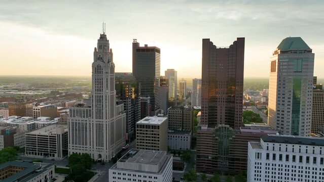 Slow orbit aerial video Columbus OH skyscrapers at sunrise