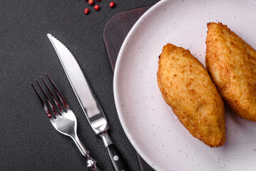 Delicious baked potato cutlet stuffed with chicken and vegetables, spices and salt