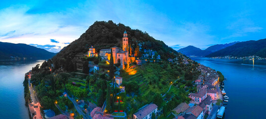 Aerial view of the Swiss village of Morcote during dusk. Morcote, Switzerland