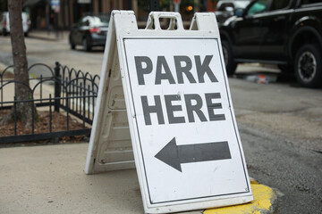 Park Here sign, representing space, convenience, access, and designated areas for specific purposes. Conceptual urban element