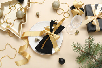 Fototapeta na wymiar Beautiful table setting for Christmas celebration on beige background