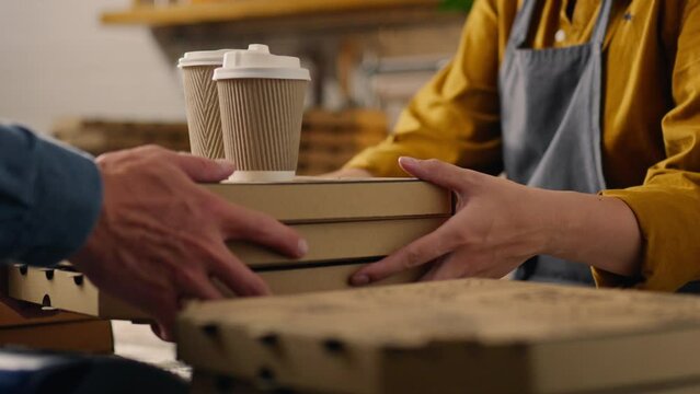 Authentic pizzeria, The chef-baker issues an order to the customer, Receipt of the order in a ready-made pizza in a cardboard box, The buyer-customer picks up the order at the food delivery center