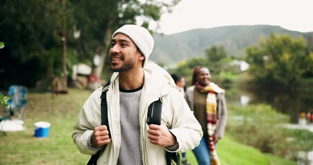 Outdoor, hiking and man with travel in nature with forest and freedom with view. Friends, young people and park walk for camping in winter on vacation and holiday with walking in woods on path