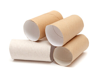 pile of empty rolls of toilet paper isolated on white background.