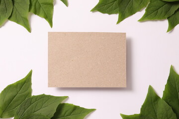 blank sheet of paper with leaves