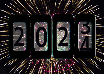 New Year 2024 odometer on fireworks in black night sky background