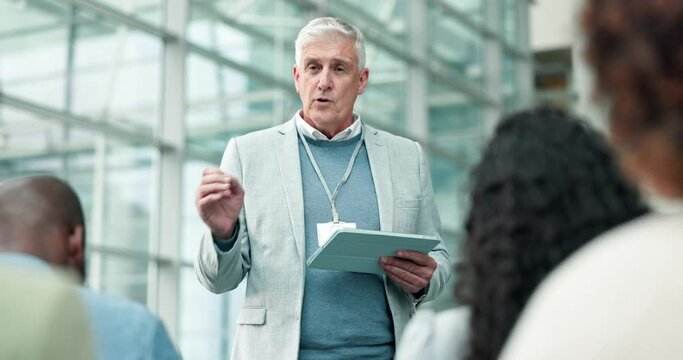 Speaker, tablet and presentation with old man in workshop for conference, seminar and project management. Web, responsive design and strategy with business people for coaching, mentor and leadership