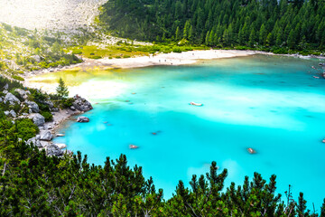 Beautiful view on the turquoise Sorapis lake in the morning. Lake Sorapis, Dolomites, Belluno, Italy, Europe.