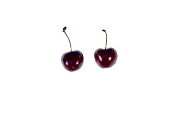 red cherry isolated on a white background. Top view