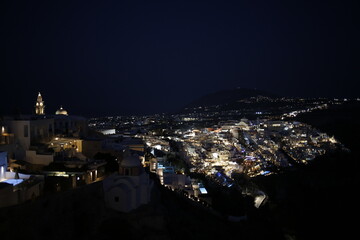 Night skyline of the beautiful touristic town of Thera in Santorini, Greek islands