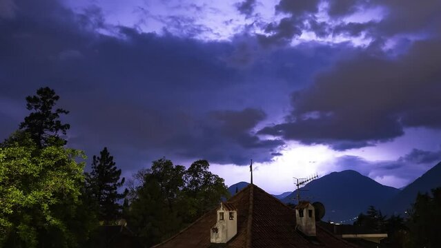 Time lapse sequence of thunderstorm lightning at night over Merano. Italy