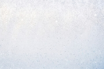 Obraz premium A white background with silver glitter.