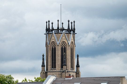 the distinctive steeple of the of the Herz-Jesu church in cologne-Mülheim without the steeple hood which was destroyed in ww2 and not rebuilt