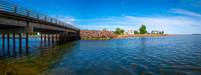 Tranquil seascape panorama over the Scoudouc River and Bridge in Shediac, New Brunswick, Canada