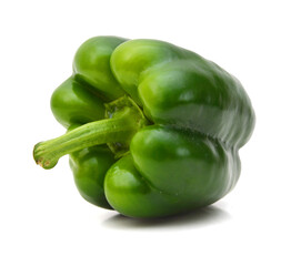 Sliced green bell pepper in a bowl on white background