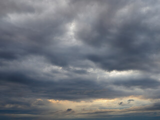 Dark storm clouds stretching towards the horizon