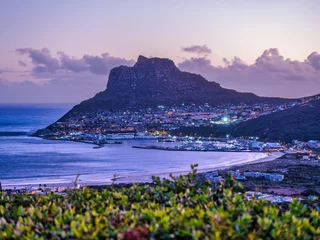 Foto auf Leinwand Hout Bay harbour and the fisherman town at the foothill of the mountain, Cape Town, South Africa © Arnold